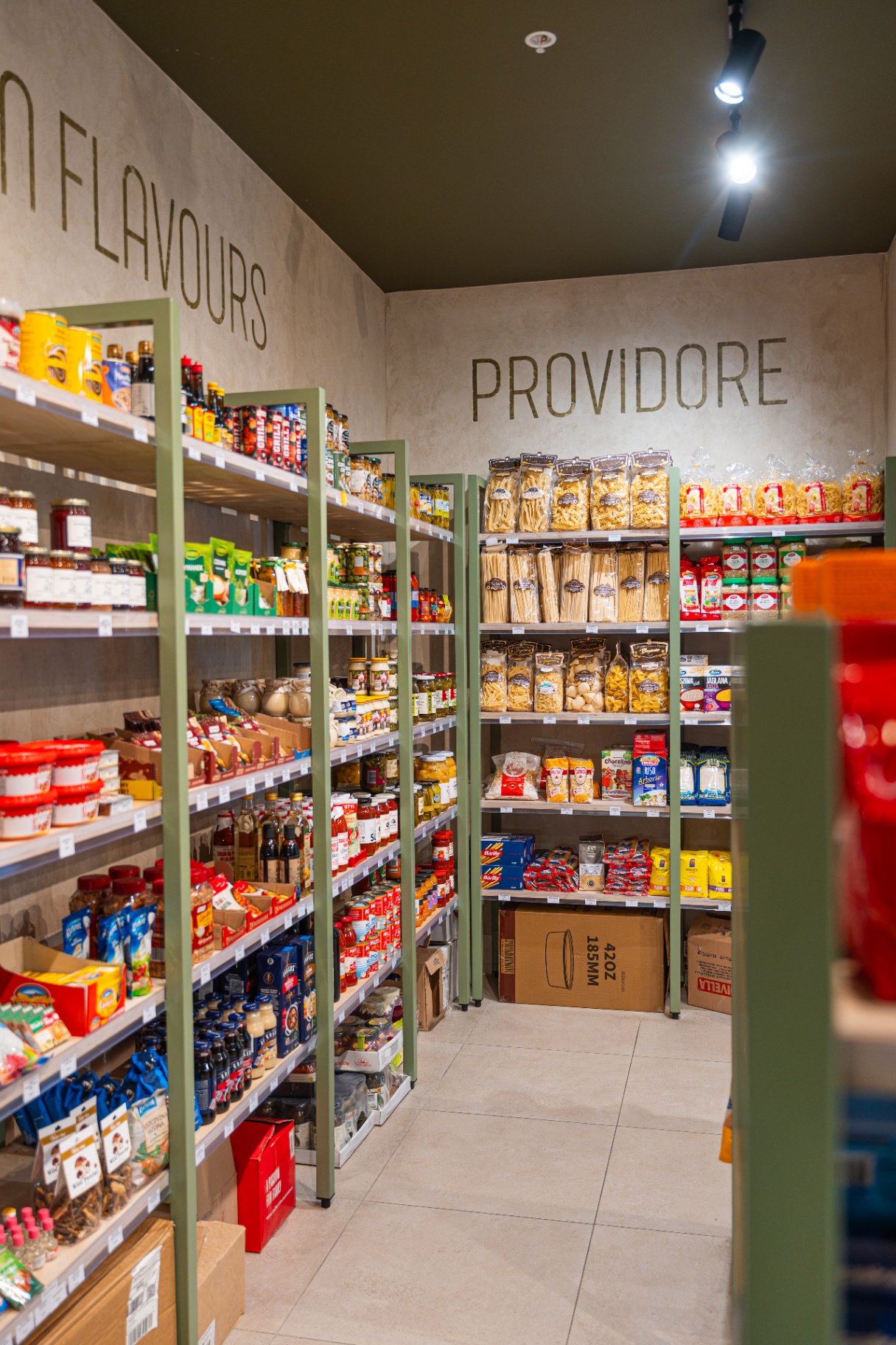 Aisle of imported European groceries and pantry staples at Miro's Deli
