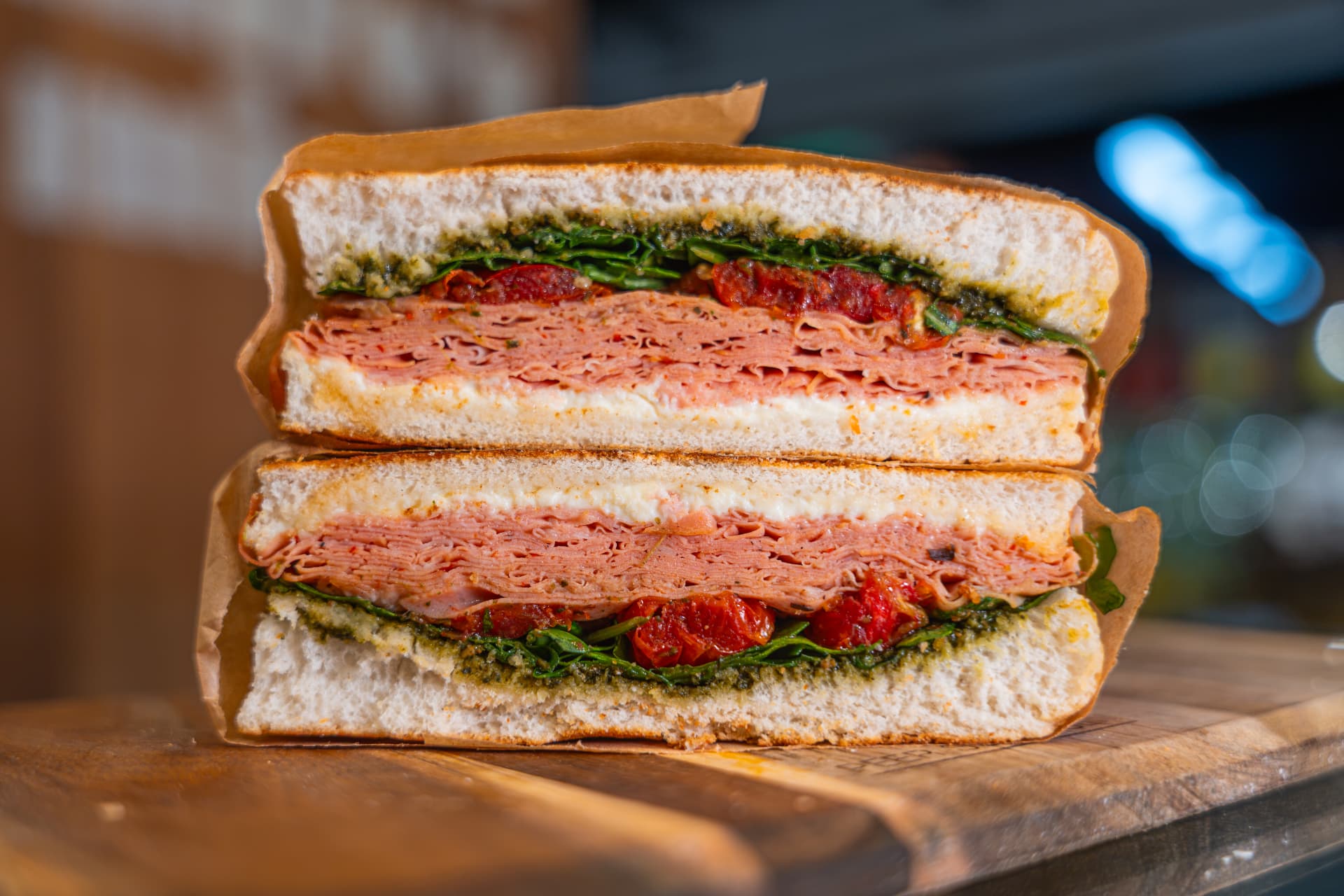 Bella Mortadella focaccia sandwich stacked and wrapped.